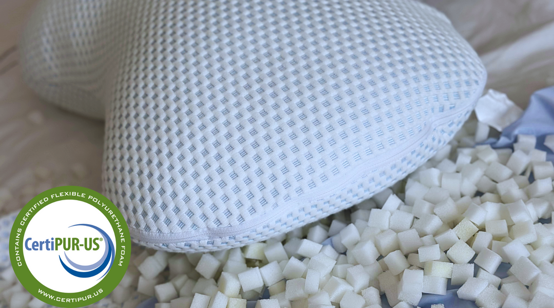 the clutcher pillow set on cubes filling showing the end view and the well crafted zipper with the CertiPUR logo added 