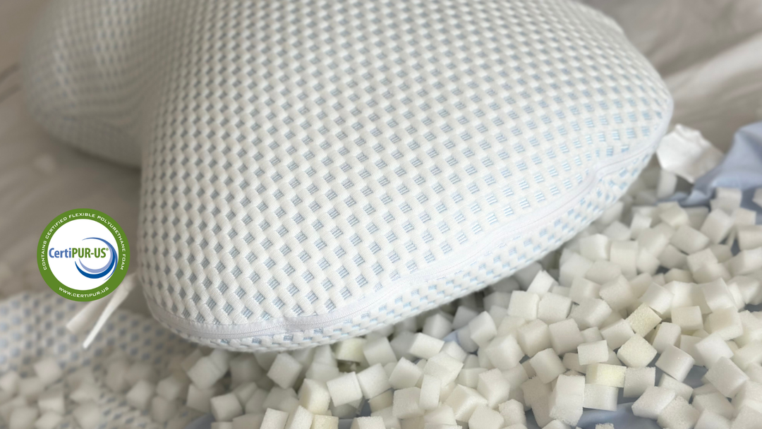 clutcher pillow with CertiPUR-US logo on a bed with filling foam pieces